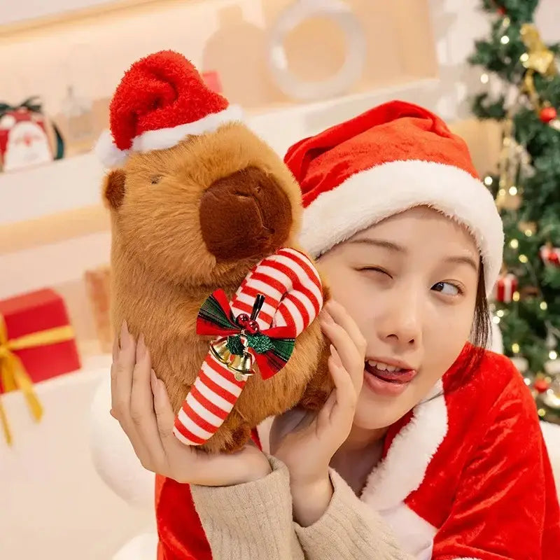 Peluche de carpincho navideño de 25 cm