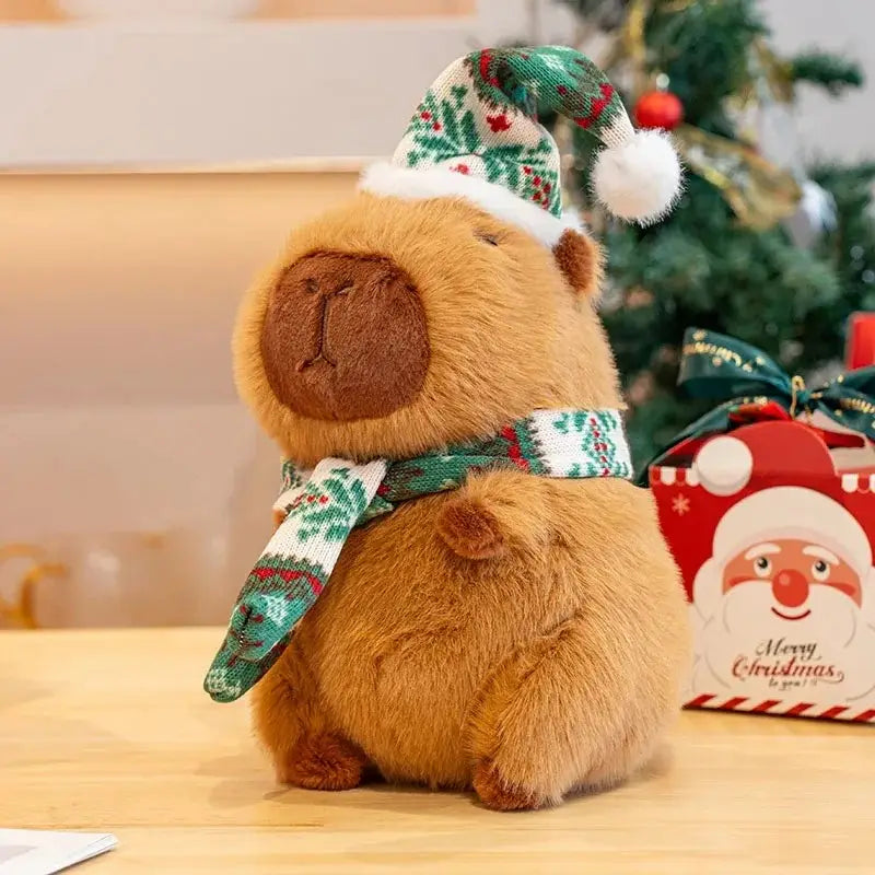 Peluche de carpincho navideño de 25 cm