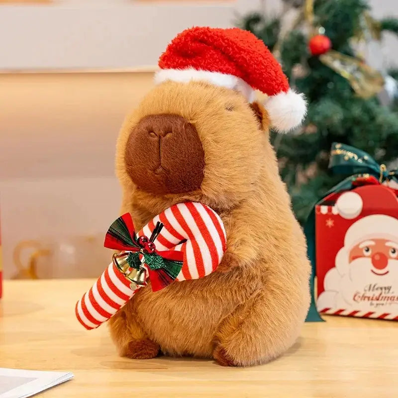 Peluche de carpincho navideño de 25 cm